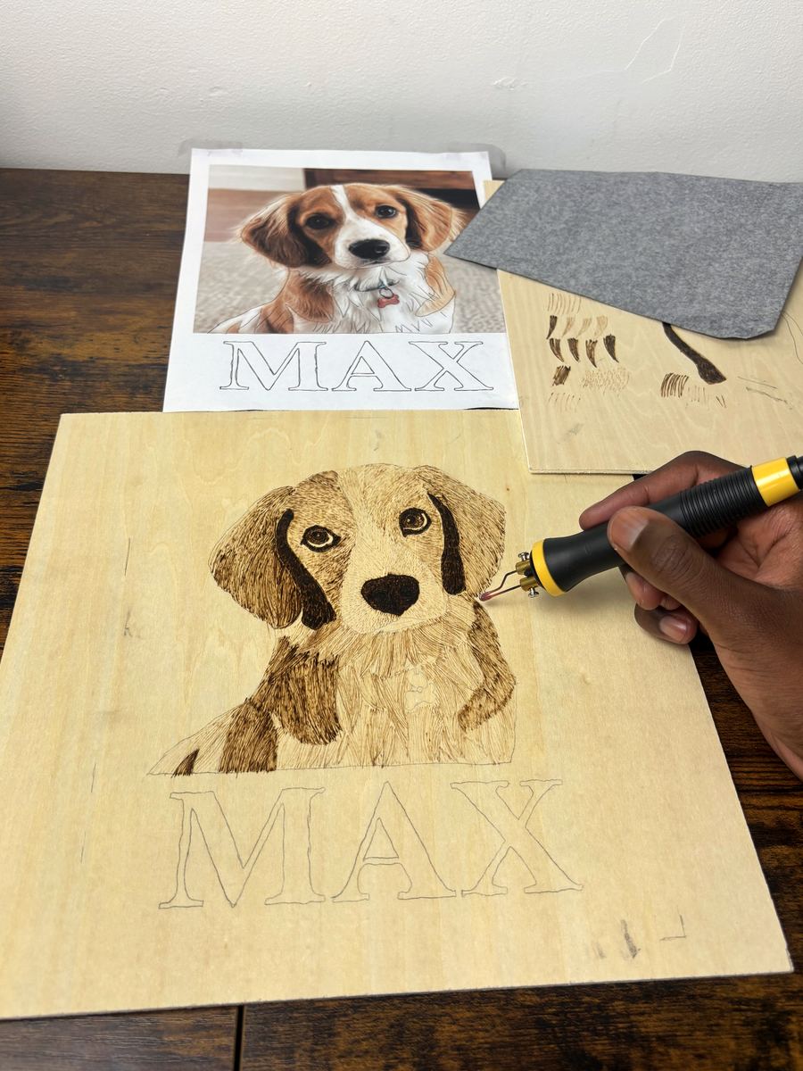 A practice board with the dog's own ear, cheek, brow and chin shapes each burned in three progressively deeper fur passes, beside the portrait